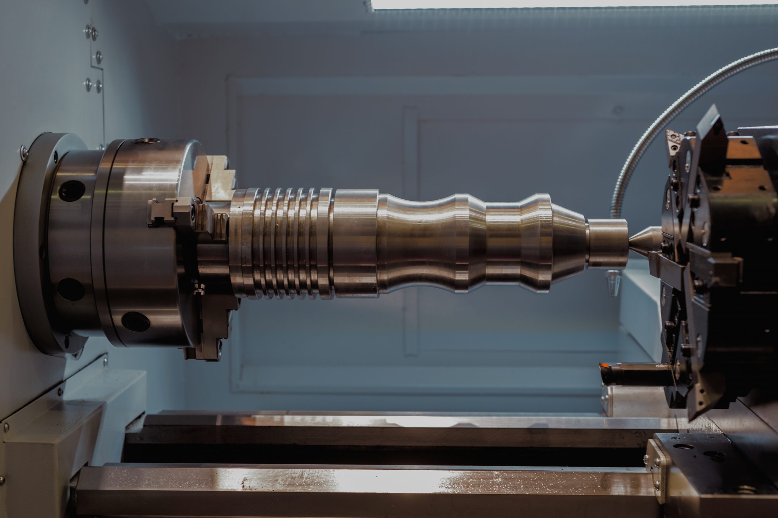 Machining of parts on a lathe.