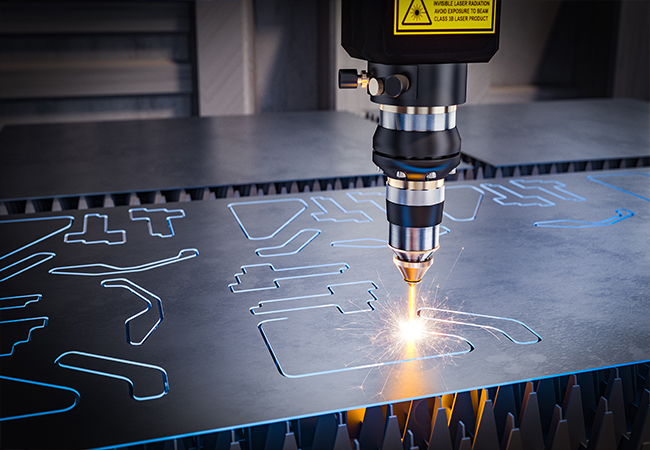 Portrait of worker near metalworking machine, steel factory background.